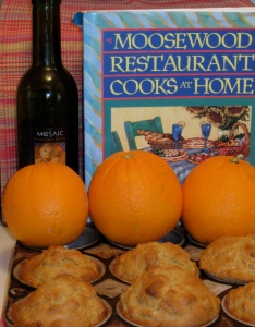 photo shows Mosaic blood orange oil, cookbook, oranges and muffins